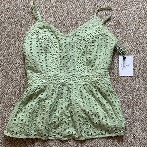 Small, Sage Green Lace Tank Top.  It has adjustable straps,  never been worn.